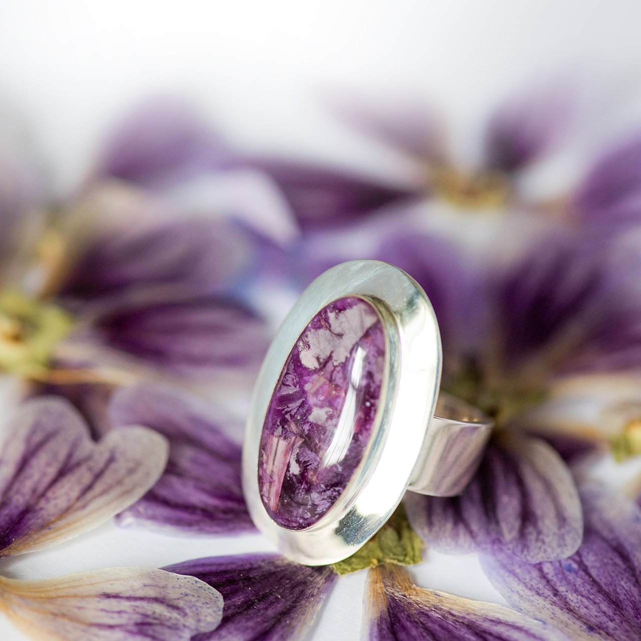 Artful Bracelets's bold Cocktail ring with purple flowers.