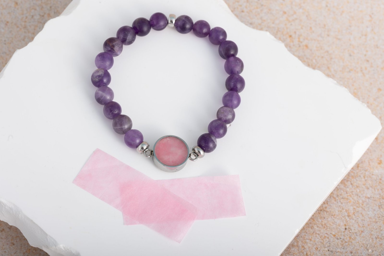 Purple bracelet with pink confetti