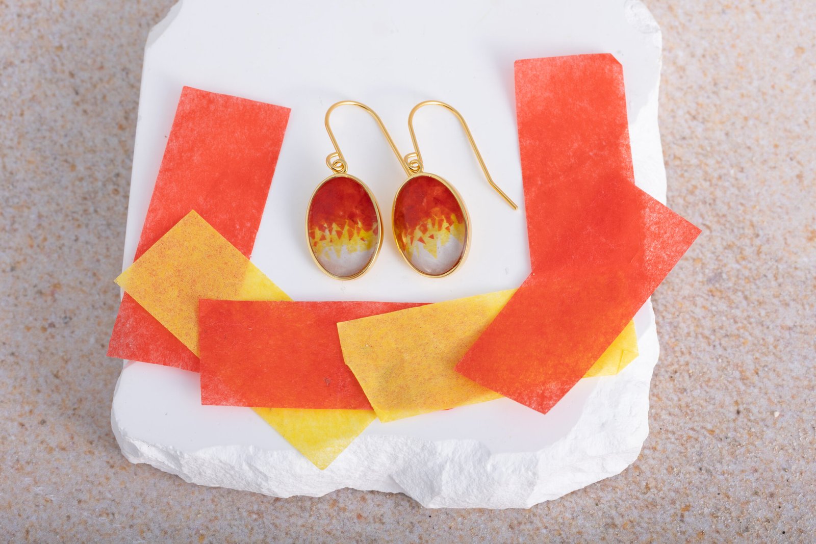 Bright orange and yellow confetti made into Sandrop earrings.